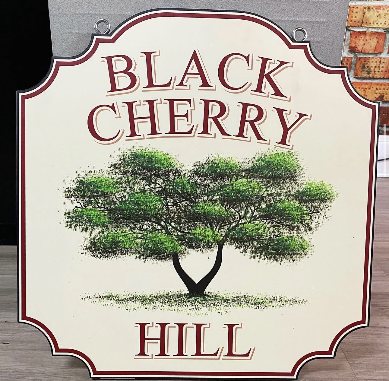 Black Cherry Hill custom shaped sign